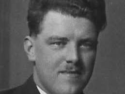 Schwarz-weißes Porträt von Ferdinand Janisch II als junger Mann in Anzug und Krawatte